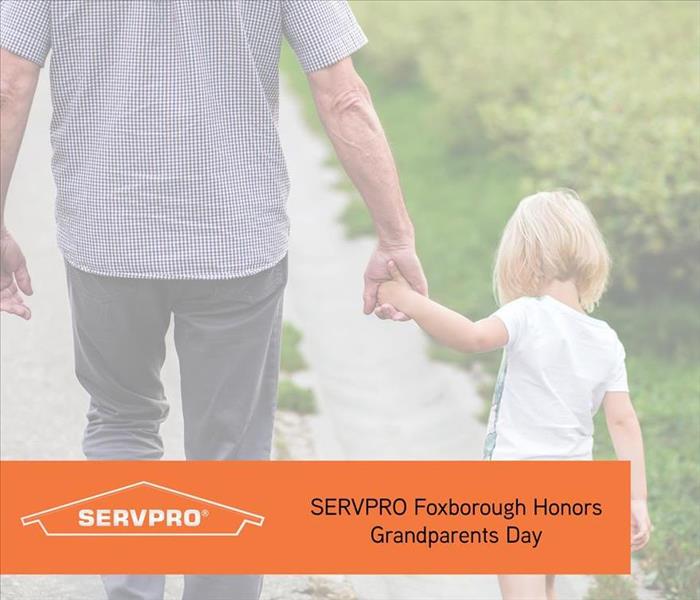 Grandparents with orange text and SERVPRO logo