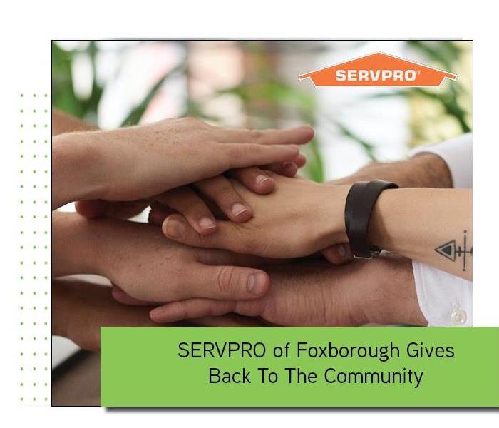 Hands in background with green box and SERVPRO logo 